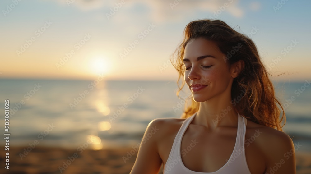 Naklejka premium Gelassenheit bei Sonnenuntergang: Frau praktiziert Yoga am Meer für inneren Frieden