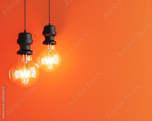 Minimalist Orange Background with Glowing Light Bulb