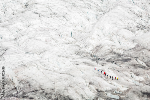 Abstract shot of people walking on a glacier
