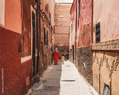 Woman and child in the streets of Marrakech, Morocco.
