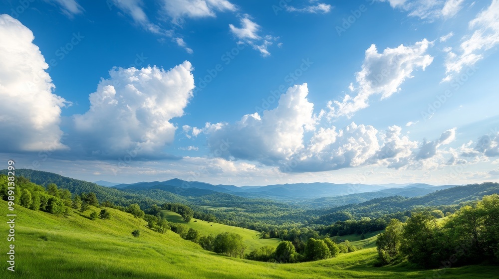 Breathtaking panoramic view of lush green hills and valleys with a scenic blue sky Breathtaking panoramic view of lush green hills and valleys with a scenic blue sky