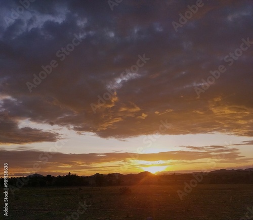 sunset over hills