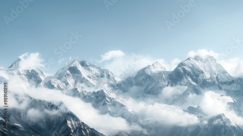 aerial view panorama view of cold snowy mountains ranges peaks at altitude landscape covered with clouds at daytime