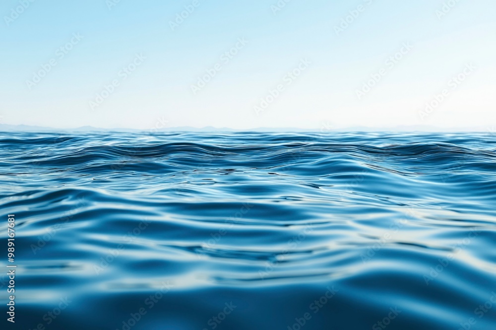 Calm Ocean Water with Gentle Ripples and a Hazy Sky Calm Ocean Water with Gentle Ripples and a Hazy Sky