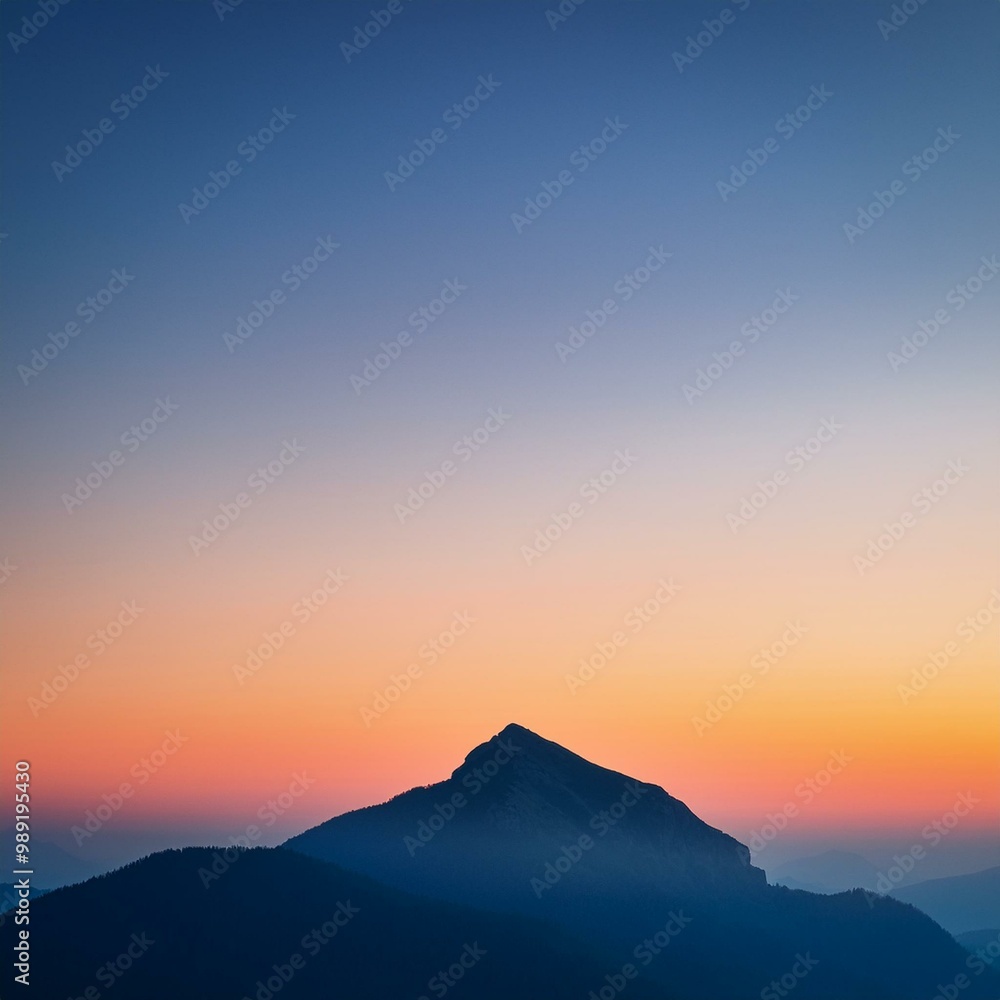minimalist landscape. Solitary mountain peak silhouetted against gradient sky minimalist landscape. Solitary mountain peak silhouetted against gradient sky