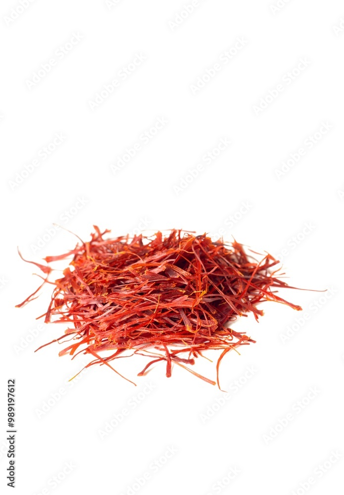 Naklejka premium Closeup of Organic Saffron or Kesar Heap Isolated on White Background with Copy Space in Vertical Orientation