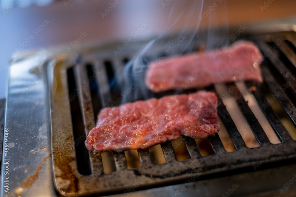 Japanese Wagyu Beef on BBQ charcoal grill stove