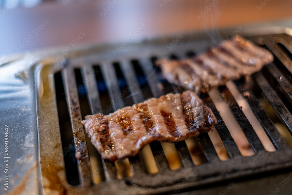 Japanese Wagyu Beef on BBQ charcoal grill stove