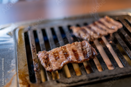 Obraz na płótnie Japanese Wagyu Beef on BBQ charcoal grill stove w salonie