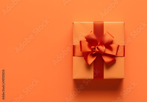 Orange Gift Box with Red Ribbon Bow