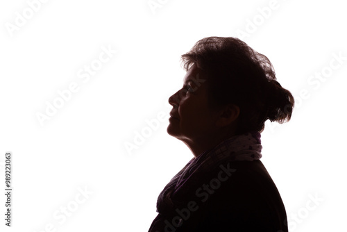 Dark silhouette of an elderly woman, pensioner, curly hair - isolate