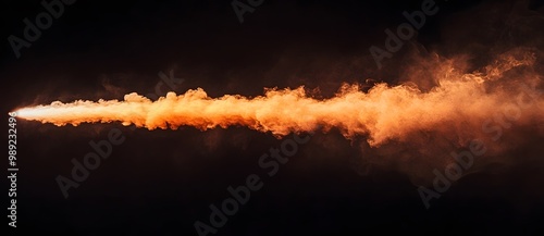 Orange Smoke Trail On Black Background photo