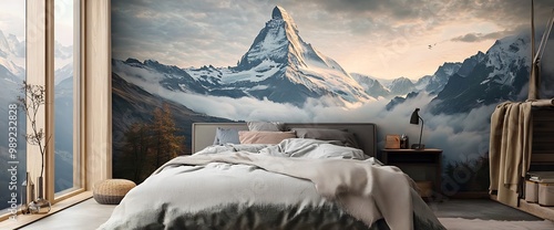 Bedroom with a mountain photo mural on the wall. photo