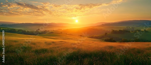 Breathtaking Sunrise Over a Lush Tranquil Meadow Landscape with Rolling Hills and Vibrant Skies Symbolizing the Beauty of New Beginnings and Peaceful Retreats