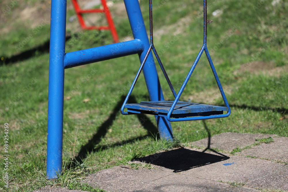 Fototapeta premium Blue swing in the park