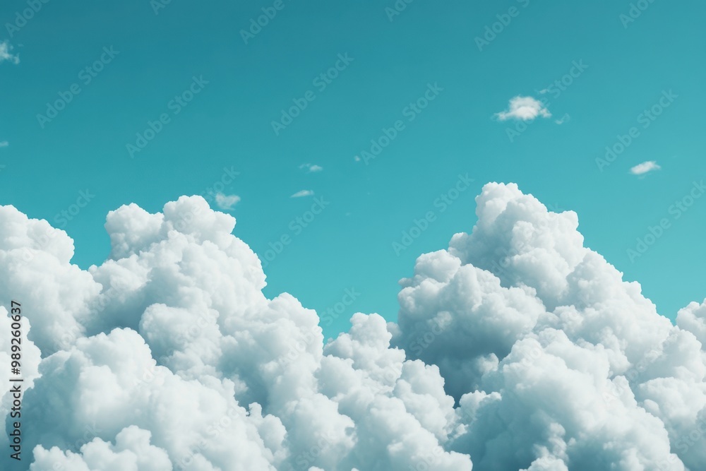 Naklejka premium Serene Cloudscape - Tranquil Nature Scene with Soft Clouds Drifting in Blue Sky for Meditation and Peaceful Atmosphere