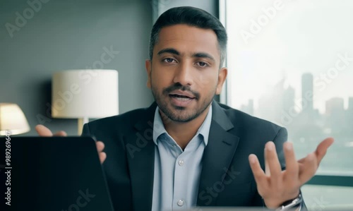 Wallpaper Mural Iraqi Man Discussing Company Development Strategy in Modern Office Torontodigital.ca