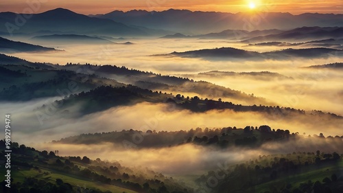 Breathtaking sunrise over mountains, casting warm light across misty valleys—a tranquil moment in nature's beauty.