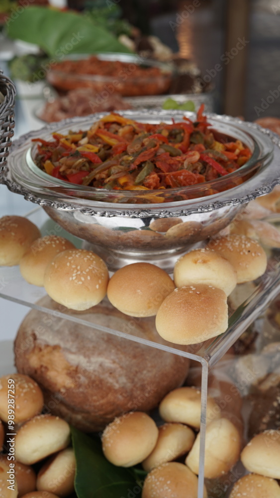 a beautiful table of cold cuts and cheeses at an elegant party