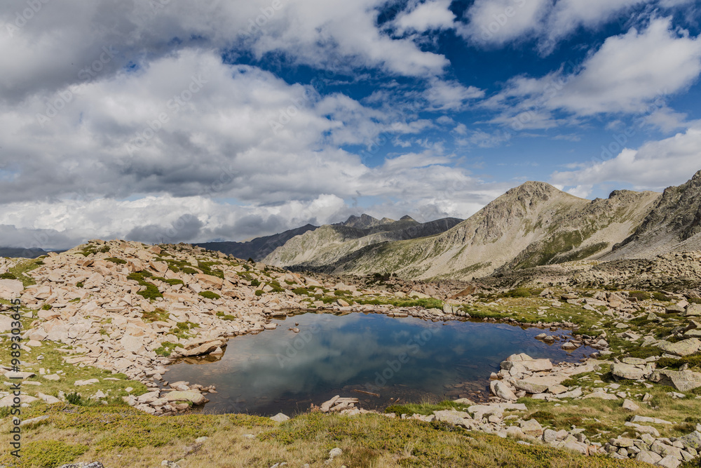 Estany del Cap dels Pessons, lake de Pessons in the Pyrenees mountains of Andorra, summertime Estany del Cap dels Pessons, lake de Pessons in the Pyrenees mountains of Andorra, summertime