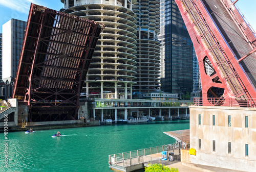 Chicago River bridges in downtown area lifted to allow water traffic photo