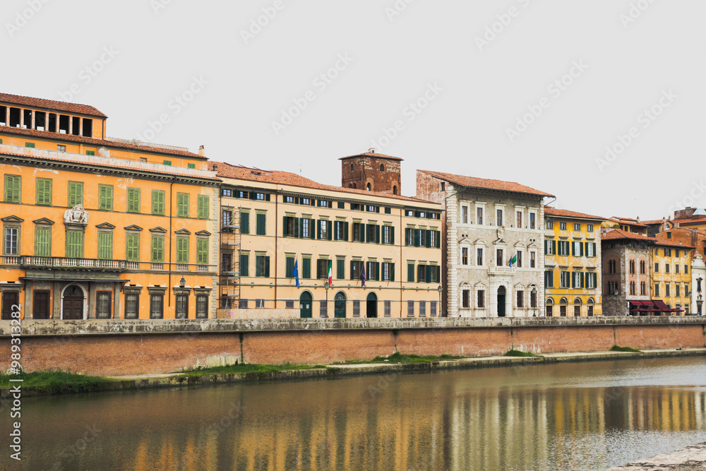 Obraz premium Lungarno Pacinotti, the neighborhood along the bank of the Arno River in Pisa, Tuscany, Italy