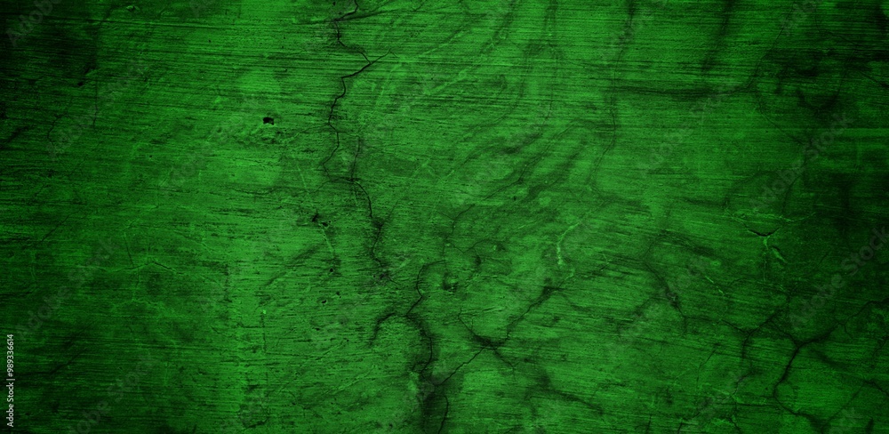 Fototapeta premium the long wall background is green, blank uncoated canvas or scrim for background long and wide panoramic banner background from rough linen dark green cloth or burlap