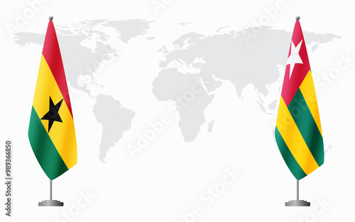 Ghana and Togo flags for official meeting against background of world map.