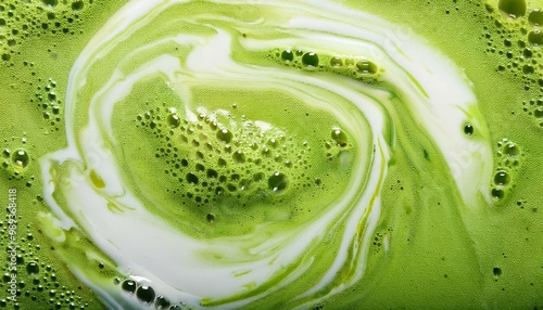 Wallpaper Mural Green tea matcha mixing with milk texture background. Food and drink close up Torontodigital.ca