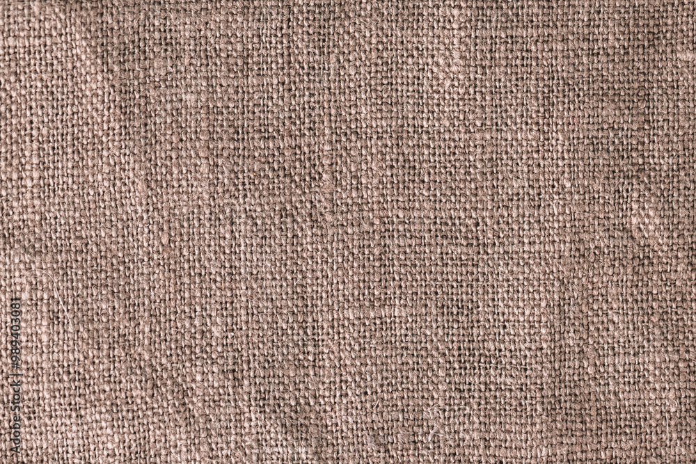 Close up background, natural craft brown linen fabric, thread weave, textile texture, perfect for backgrounds, textiles, wallpapers Close up background, natural craft brown linen fabric, thread weave, textile texture, perfect for backgrounds, textiles, wallpapers