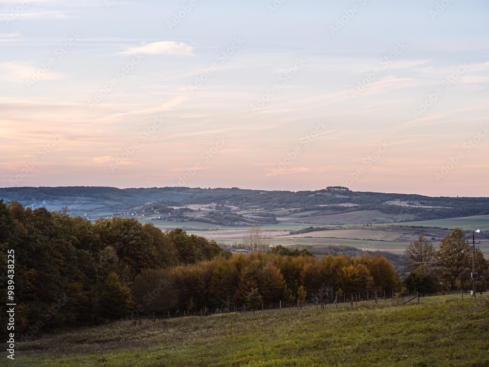 Fototapeta premium Scenic Countryside Landscape with Autumn Forest and Rolling Hills