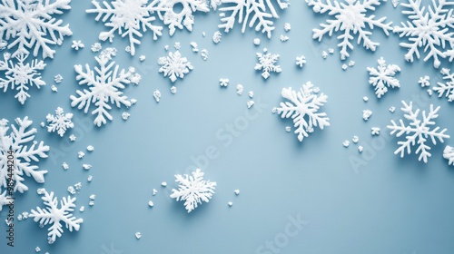 Winter theme greeting card background, snowflakes on blue background photo