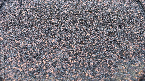 Cuadro en lienzo textured grainy background of soft shingle material close up, red gray dotted ro