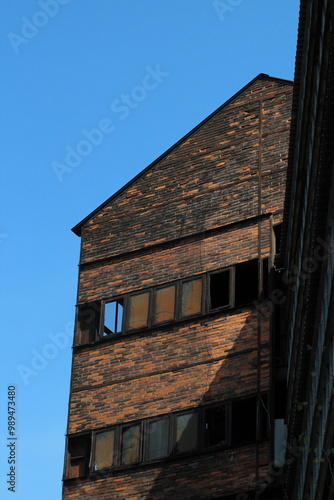 Old red brick and metal buildings in Closed metallurgical plant in Lower Vitkovice, part of famous tourist industrial complex, Ostrava, Czech Republic 