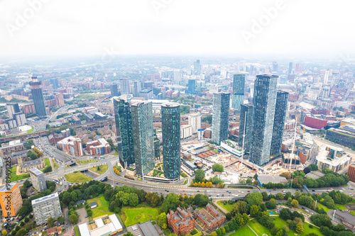 Commercial area, highrise tower office building in Deansgate Manchester, overcast day, aerial view