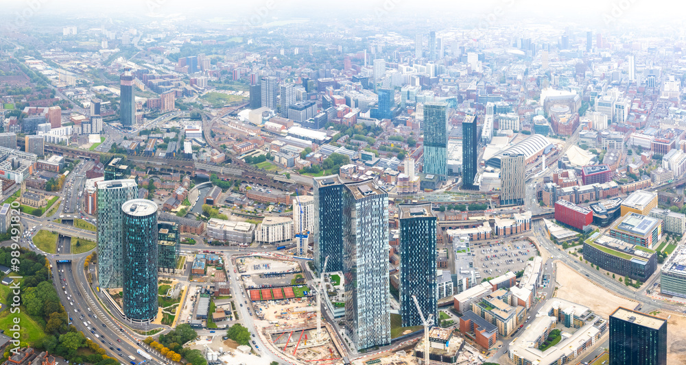 Commercial area, highrise tower office building in Deansgate Manchester, overcast day, aerial view Commercial area, highrise tower office building in Deansgate Manchester, overcast day, aerial view