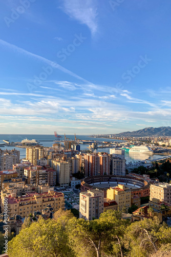 Sunrise over Malaga port and sea coast in a sunny day in the morning in Malaga, Spain