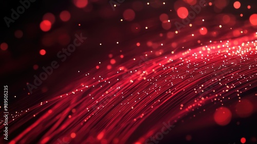 Red optical fibers transmitting data representing rapid internet speeds and seamless connectivity
