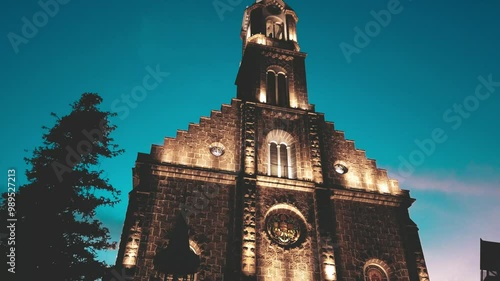 Matriz Church in the center of Gramado city, Rio Grande do Sul lit up at night on a beautiful day with a clear sky