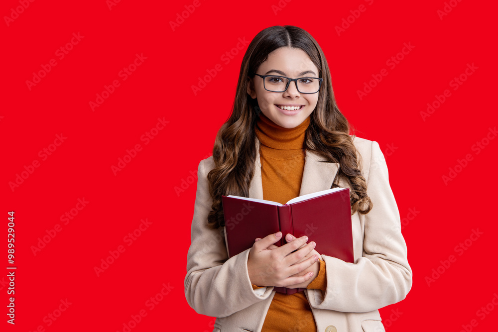 Teen girl isolated on red, copy space. Autumn is time to study. Education and knowledge. School education. Back to school. Autumn girl hold school homework. Education for college student Teen girl isolated on red, copy space. Autumn is time to study. Education and knowledge. School education. Back to school. Autumn girl hold school homework. Education for college student