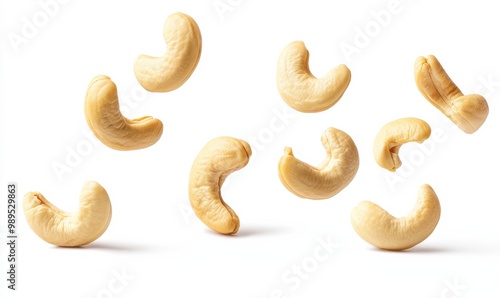 Cashew Nuts Floating in Mid-Air on white background, food advertising.