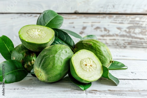 Feijoa fruit and leaf on white background Tropical pineapple guava Green acca sellowiana plant photo