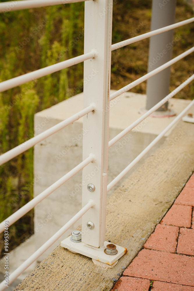 Details of the bridge. Metal fencing, flooring, fasteners, fittings Details of the bridge. Metal fencing, flooring, fasteners, fittings