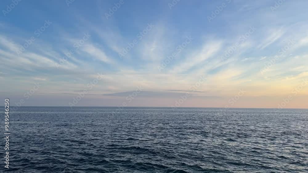 Beautiful sky clouds over the sea dark blue waves. Beautiful sky clouds over the sea dark blue waves.