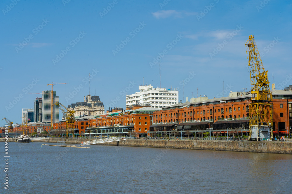 Fototapeta premium View of the docks with the old buildings recycled and transformed into offices and apartments.