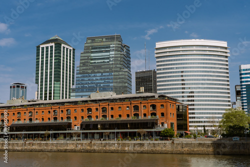 View of the docks with the old buildings recycled and transformed into offices and apartments. photo