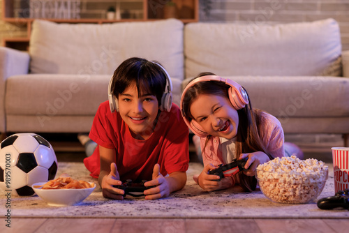 Little children playing vid...