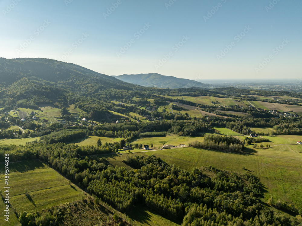 Obraz premium Beskid Maly aerial panorama of potrojna hill and czarny gron.Little Beskids mountain range in summer.Aerial drone view of Rzyki Village in Beskid Maly Poland.Czarny gron ski resort in Rzyki.