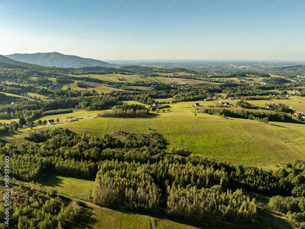 Obraz premium Beskid Maly aerial panorama of potrojna hill and czarny gron.Little Beskids mountain range in summer.Aerial drone view of Rzyki Village in Beskid Maly Poland.Czarny gron ski resort in Rzyki.