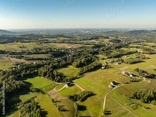 Beskid Maly aerial panorama of potrojna hill and czarny gron.Little Beskids mountain range in summer.Aerial drone view of Rzyki Village in Beskid Maly Poland.Czarny gron ski resort in Rzyki. photo